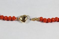 -Vintage 14k Gold Heart Shape Clasp with Natural Red Italian Sardinia Coral Necklace -Total length: 21.5 in -Biggest bead size: 9.45 mm -Smallest bead size: 4.65 mm -Total weight: 18.5 g -Marked 14k -Not perfectly round Elegant Orange Heart-shaped Jewelry, Coral Earrings, Coral Necklace, Natural Red, Heart Of Gold, Heart Shapes, Necklace Etsy, Coral, Beaded Necklace