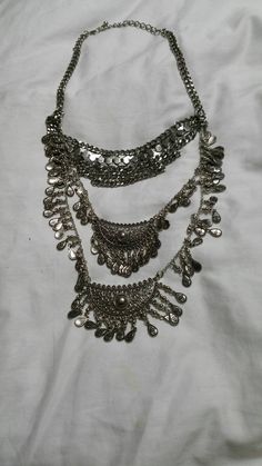 Silver Toned Metal Tear Drop Bead Leaf Style 28 inch Bib Necklace Costume Jewelry This is priced to sell. Very decorative. It a wonderful find. The bib measures 5 inches long and 7 inches wide. Check out our shop for monthly specials. We have a variety of items for every taste. Combine several of our items together to save on shipping. If you have any questions please do not hesitate to ask. I will ship outside of the US, just request a quote. Happy Shopping. I will work around the priority mail Bohemian Long Chain Layered Necklace, Bohemian Layered Chain Necklace, Bohemian Long Layered Chain Necklace, Silver Bohemian Beaded Necklaces With Chain, Bohemian Silver Long Necklace With Round Beads, Silver Bohemian Long Necklace With Round Beads, Costume Jewelry Metal Beaded Necklaces For Festivals, Bohemian Long Metal Chain Necklace, Silver Bohemian Beaded Necklaces With Chain Detail