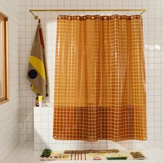 Sun Shower in Honey 2x2 front view of curtain hanging in a bathroom. Canvas Curtains, Orange Curtains, Mirror With Hooks, Occasional Seating, Floor Table, Grid Style, Wall Accessories, Bed Desk, Shower Curtain Hooks