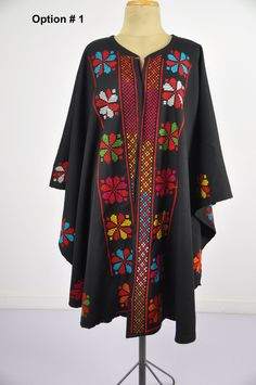 This vintage cape jacket is definitely a vintage fashion statement. It is 100% hand embroidered with geometrical patterns. It can be used over a jeans and shirt or sweater. Great to keep you warm. Please note that the capes we have at the moment (Option #1 and Option #2) are without a hoodie but they are just as beautiful and practical. Material : Wool Length : 49 inches Size : One size fits all. We ship your order with DHL express within one to two business days. Orders to Europe will typically Traditional Hooded Winter Poncho, Winter Festival Embroidered Poncho, Winter Embroidered Long Sleeve Poncho, Traditional Embroidered Winter Poncho, Traditional Embroidered Poncho For Winter, Embroidered Cape Outerwear For Fall, Vintage Black Cape For Winter, Traditional Black Shawl Outerwear, Vintage Black Winter Cape