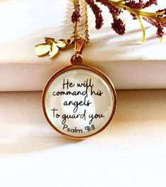 This Beautiful Minimalist Christian Necklace is made with a 25 mm cabochon gold stainless steel and a gold stainless steel chain. this bible verse/ Christian Necklace comes with a chain 18 inches long. it comes with a stainless steel little angel charm, 10 mm. the cabochon quote reads: He will command his angels to guard you. Psalm 91:11 is a very nice gift for graduation, for Mother's Day, baptism gift. delicate and elegant necklace for women. chain lengths:  -18 inches -24 inches Christian Minimalist, Psalm 91 11, Bible Verse Necklace, Scripture Jewelry, Bible Verses For Women, Bible Women, Angel Charm, Christian Necklace, Android Wallpaper Flowers