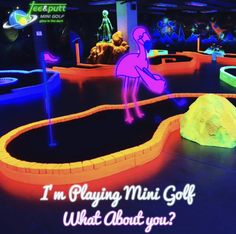 an interactive miniature golf course with neon lights