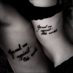 two women with matching tattoos saying you and me against the world