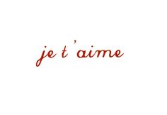 the word je t'aime written in red ink