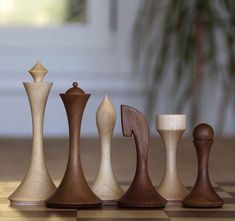 the chess pieces are made out of wood