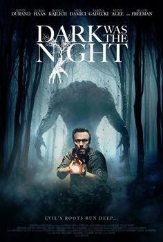 the movie poster for dark was the night with a man holding an apple in his hand