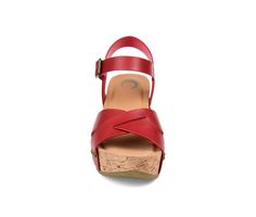 The crisscross toe straps and synthetic cork block heel are fabulous on the Valentina sandal from Journee Collection. This chic sandal features bold studded details and an ankle strap with a fashionable square buckle. Its 1 �" platform completes the look. Thanks to a cushioned insole and treaded bottom sole, you can take these sandals anywhere and be comfortable and stable. Available in a beautiful floral pattern. Faux leather upper,Buckle closure,Approx. 3 inch heel,Open toe,Cushioned footbed f Synthetic Sandals With Adjustable Cross Strap, Spring Sandals With Adjustable Strap And Wedge Heel, Summer Strappy Slingback Sandals With Strap Closure, Summer Slingback Sandals With Cross Strap And Buckle, Summer Cross Strap Slingback Sandals With Buckle, Summer Cross Strap Slingback Sandals With Buckle Closure, Chic Sandals With Strap Closure For Summer, Chic Strap Closure Sandals For Spring, Chic Spring Sandals With Strap Closure