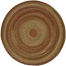 a round rug with red, green and tan colors on the bottom is shown in front of a white background