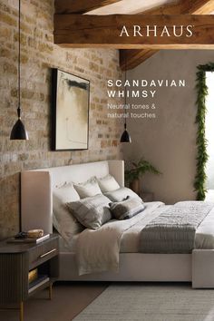 a bed sitting in the middle of a bedroom next to a brick wall and ceiling