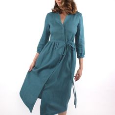 "This linen dress is very comfortable and feminine. V-neckline Hidden buttons closure Relaxed fit dress Half-length puffed sleeves Side seam pockets The model wearing size S and 172 cm/5'7\" tall. COLOR:  turquoise GARMENTS ARE DESIGNED FOR 164-176 CM HEIGHT ( 5'5\"-5'9\") PLEASE LEAVE A NOTE WITH YOUR ORDER, IF YOUR HEIGHT DOES NOT FALL IN THIS RANGE. SIZE GUIDE  Body measurements: in cm/inch: XXS/EU34 bust: 79 cm  (31\") waist: 62 cm (24\") hips: 88 cm (34\") XS/EU36 bust: 84 cm (33\") waist: Red Ruffle Dress, Natural Linen Dress, Linen Dress Summer, Summer Linen Dresses, Red Dress Women, Linen Shirt Dress, Dress Wrap, Dress Linen, Dress Handmade