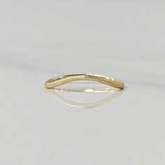 The characteristic of this ring is the elegant twisted shape and nail sand finish of the ring arm, which seems to be gently wrapped around the finger, not only enhancing the three-dimensional sense and flowing beauty of the ring, but also cleverly fitting the curve of the finger, showing the wearer's unique softness and style. The simple lines of the ring outline a modern sense. The twisted arm ring can perfectly catch the eyes of people around, and become the finishing touch to enhance the over Womens Rings Simple, Sand Nails, Arm Ring, Womens Rings, Simple Rings, Types Of Gemstones, Personalized Rings, Rings Jewelry, Couple Rings