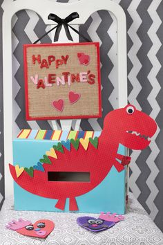 a valentine's card box with a dinosaur on it