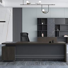 an office with gray walls and black furniture