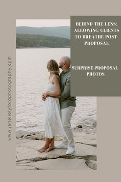 a man and woman standing next to each other on top of a rock near the water