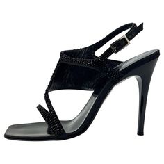 Check out this item from 1stdibs! Early 2000s Gucci Tom Ford Black Beaded Strap Heels Size 38C: https://www.1stdibs.com/id-v_15862612 Elegant Gucci Sandals For Evening, Gucci Formal Sandals With Pointed Toe, Gucci Pointed Toe Sandals For Formal Occasions, Gucci High Heel Sandals For Evening, Luxury Gucci Evening Sandals, Gucci Open Heel Party Heels, Gucci Open Heel Sandals For Evening, Gucci Ankle Strap Heels For Night Out, Gucci Heels With Heel Strap For Evening