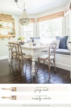 the dining room table is set with four chairs, and has been painted in white