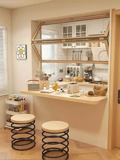 two stools sit in front of a counter