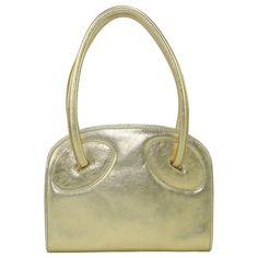 Laura Biagiotti Attributed Gold Leather Handbag, 1970's | From a unique collection of rare vintage Top Handle Bags at https://www.1stdibs.com/fashion/handbags-purses-bags/top-handle-bags/. Essence Types, Gamine Essence, Lb Logo, Classic Essence, Flamboyant Gamine, Evening Accessories, Designer Top, Chic Leather, Laura Biagiotti