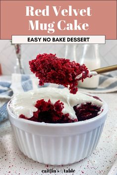 red velvet mug cake with white frosting in a bowl on top of a table