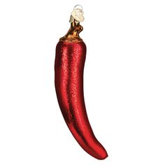 a red chili pepper ornament hanging from a string on a white background with clippings