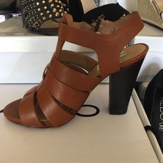 Brown Cognac Herls Brown Sandals With 4-inch Heel For Party, Elegant Brown Sandals With 4-inch Heel, Brown Sandals With Reinforced Heel, Chic Cognac Heels, Brown Sandals With Reinforced Heel And Medium Width, Brown Heels For Summer Formal Events, Brown Summer Formal Heels, Brown Heels For Formal Summer Events, Brown High Heel Sandals With 4-inch Heel