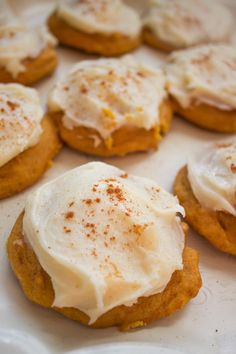 some cookies with icing and cinnamon on top