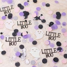 there are many little boos on the table with confetti around them that says little boo