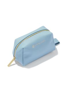 Stash all your dainty essentials while on the go in the Small Cosmetic Zip Case in Light Blue. A small pouch with a zipper closure, this travel necessity keeps your everyday essentials organized and protected. Plus, its dainty size makes it easy to store it in any purse, backpack, or duffel. Material Polyurethane Size 6.1" (L) X 3.5" (W) X 3.7" (H)Due to the one-of-a-kind nature of the medium, exact colors and patterns may vary slightly from the image shown. | Kendra Scott Small Cosmetic Zip Case in Light Blue | Leather Blue Kendra Scott, Kendra Scott Store, Travel Necessities, Purse Backpack, Small Pouch, Stocking Stuffer Gifts, Small Pouches, Makeup Bags, Makeup Pouch