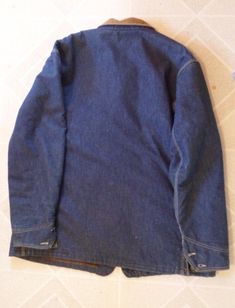 "If you're in the market and it will fit you won't be disappointed. Buttons are all nice and tight with the LEE logo. Snaps all snap and it still remains a nice dark blue the only defect ( see photo ) is a penny sized hole on the right rib side of the jacket. Across the back it's 21 1/2\" from back neck seam to bottom it's 32\" long across the chest it's 27\" from shoulder seam to end of cuff it's 26\" long and from underarm seam to end of cuff it's 20 1/2\" long. No sized is shown on the labels Lee Logo, Make Blanket, Sides For Ribs, A Penny, Chore Jacket, Union Made, Denim Jean, Denim Button Up, Penny