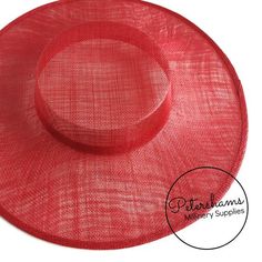 Boaters are all the rage, and this red sinamay fascinator version has us all in a twirl! Made from 2 layers of stiffened sinamay, these boaters are ready to trim and have a petersham ribbon on it's inside edge. Simply add a comb or headband to secure to the head.Hat base measures:Width: 37cm (14.5 inches)Crown Width: Measures 15.5cm (6.1 inches) wide at base and 14cm (5.5 inches) at top Crown Height: 4.5cm (1.7 inches)Please note our latest batch of boaters have been made slightly bigger this ti Adjustable Red Brimmed Straw Hat, Red Adjustable Brimmed Straw Hat, Adjustable Red Hat Bands For Spring, Red Brimmed Hat Bands For Kentucky Derby, Red Hat Bands For Kentucky Derby, Adjustable Flat Brim Red Boater Hat, Adjustable Red Boater Hat With Flat Brim, Red Adjustable Boater Hat With Flat Brim, Red Brimmed Sun Hat For Party