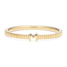 Personalize any ring stack with this 14-karat yellow gold letter ring  featuring an M in the center and a beautiful fluted band. It’s available in letters A-Z  so you can find one that’s unique to you and your style. Whether opting for a first or last initial  it also makes the perfect personal gift. The Letter M, Letter Ring, Gold Letter, Ring Stack, Trendy Ring, Letter M, Letter B, Gold Letters, Trendy Gift