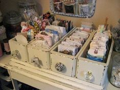 an old dresser is filled with lots of items and has drawers that hold many things