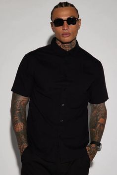 Ryland Short Sleeve Button Up Shirt - Black | Fashion Nova, Mens Shirts | Fashion Nova Black Relaxed Fit Shirt With Buttons, Black Relaxed Fit Shirt With Button Closure, Fitted Short Sleeve Black Shirt With Buttons, Fitted Black Button-up Short Sleeve Shirt, Fitted Black Short Sleeve Button-up Shirt, Black Top With Button Closure For Streetwear, Black Relaxed Fit Button-up Shirt, Black Collared Short Sleeve Shirt With Button Closure, Black Button-up Shirt For Streetwear