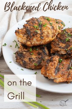 grilled chicken on the grill with text overlay that reads, blackened chicken on the grill