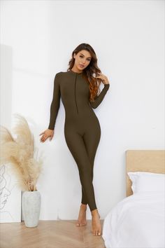 This Long sleeve bodysuits are made from High-quality custom fabrics for comfort and breathability. Solid Color High Stretch Full Length Unitard, Full Length High Stretch Solid Unitard, High Stretch Full-length Solid Unitard, Stretch Bodysuit With Zipper Closure, High Stretch Solid Elastane Unitard, High Stretch Elastane Unitard With Thumbholes, Black Catsuit, Womens Leotards, Black Leotard