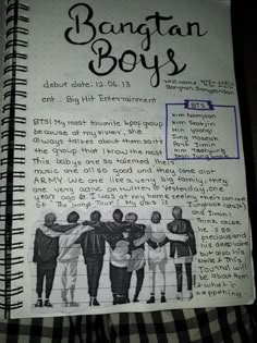 an open notebook with the words bantan boys written in black and white on it