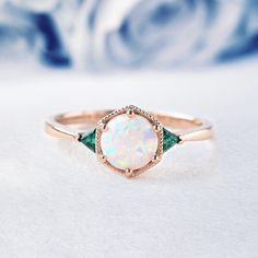 Opal Ring,Opal and Emerald Engagement Ring,Sterling Silver Ring,October Birthstone,Promise Ring, Delicate Ring, Stacking Ring,Wedding Ring Type Of Stone - Fire-Opal Stone Color - White No. of Stones - 1 Cab Opal Cut of Stones - Round Stone size - 6 mm Birthstone - October Secondary stone- Emerald ( Lab-created) Shape- Triangle Color - Green Jewelry Type: Ring Metal: Silver Method: Cast Personalization: Possible Style: Wedding Ring Set Ring Size: We make rings from US 3 to US 10. This elegant rin Square Opal Engagement Ring, Emerald Rose Gold Ring, Green Opal Ring, Emerald Gold Ring Vintage, Vintage Opal Engagement Rings, Opal Emerald Ring, Art Deco Opal Ring, Unique Opal Engagement Rings, Emerald And Opal Engagement Ring