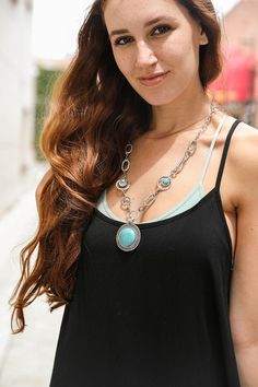 Add a pop of color to your outfit with the Soleil Turquoise & Silver Link Necklace! This stunning piece features hand-cut stones that capture the vibrant beauty of turquoise, linked elegantly with silver for a playful yet sophisticated look. Perfect for dressing up any ensemble, this necklace brings a touch of sunshine and charm to your style. Embrace your inner free spirit with this must-have accessory! 10% Stone 90% Zinc Alloy Silver Link Necklace, Gemstone Drop Earrings, Turquoise Accents, Athleisure Wear, Turquoise Pendant, Link Necklace, Bohemian Jewelry, Free Spirit, Zinc Alloy