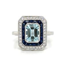 Indulge in the luxurious beauty of our 2.22ct tw aquamarine, sapphire and diamond art-deco style octagon ring. This stunning piece boasts a vibrant combination of aquamarine, sapphire, and diamond, exuding elegance and sophistication. Add a touch of glamour to any outfit with this exquisite ring. Metal: 18K White GoldRound 34 Diamond Weight: 0.24ct t.w.Center Aquamarine: Emerald Cut 1.29carat Sapphires 24 : 0.69ct t.w. - W: 16mm x 13mm For desired ring size please leave us a note at the check ou Octagon Ring, Necklace Guide, Diamond Initial Necklace, Jewelry Appraisal, Bridal Engagement Rings, Stone Collection, Jewelry Rings Diamond, Aquamarine Rings, Jewelry Repair