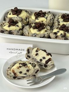 chocolate chip cookies and cream in a white dish with a fork