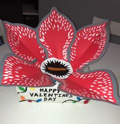 a paper flower with the words happy valentine's day written on it