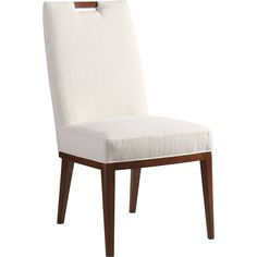 a white upholstered chair with wooden legs