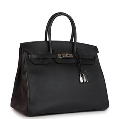 This Birkin is in Black epsom leather with palladium hardware and has tonal stitching, front flap, two straps with center toggle closure, clochette with lock and two keys, and double rolled handles.The interior is lined with black chevre and has one zip pocket with an Hermes engraved zipper pull and an open pocket on the opposite side. Collection: X Origin: FranceCondition: Pre-owned; Excellent- This bag's structured is retained. All plastic missing from hardware. Visible scratching to turnlock Hermes Birkin 35 Black, Birkin 35 Black, Hermes Birkin 35, Monogram Neverfull, Bag Interior, Hermes Box, Vintage Louis Vuitton, Hermes Bags, Black Excellence