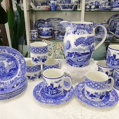 blue and white china on display at a store