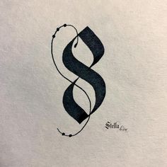 a black and white drawing of a letter s