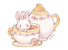 a drawing of a bunny in a teacup with a cup and saucer next to it