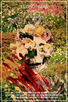 a poster with flowers on it and a skull in the middle, surrounded by grass