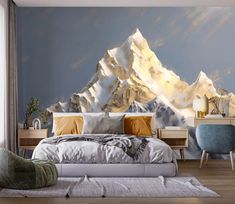 a bedroom with a mountain mural on the wall and a bed in front of it