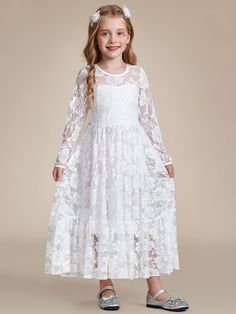 Make your flower girl stand out with this elegant lace dress featuring a timeless round neckline and long sleeves. Perfect for weddings, parties, and other special events, this dress exudes sophistication and grace. Fit: Please refer to size chart. Closure: No zipper. Undergarments: It is not padded, with lining. Fabric: The garment comprises lace. Fijian Wedding, Elegant Flower Girl Dress, Elegant Lace Dress, Formal Maternity Dress, Ankara Gown, White Flower Girl Dresses, Gown Styles, Flower Girl Dress Lace, Girl Standing