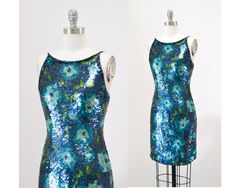 "Awesome 90s 00s Party dress!! * Sequin metallic body fully embellished with blue green sequins in floral pattern * Fit body to show off your curves * back zip closure  * Fully lined  * Great Vintage Condition * Stunning show stopper!! By Adrianna Papell Size 4 fits like a XS Small Era 90s Measurements:  Bust 33\" Waist 27\" Hip 36\" Length 35\" All measurements are given in full.  Visit the shop  https://www.etsy.com/shop/Hookedonhoney ** twitter | hookedonhoney ** pinterest | hookedonhoney ** Instagram | hookedonhoneyvintage" Blue Fitted Sequin Dress For Summer, Fitted Blue Sequin Summer Dress, Fitted Blue Sequin Dress For Summer, Fitted Blue Sequin Dress For Spring, 90s 00s Party, 00s Party, Party Dress Sequin, Perfect Birthday Dress, Sequin Party